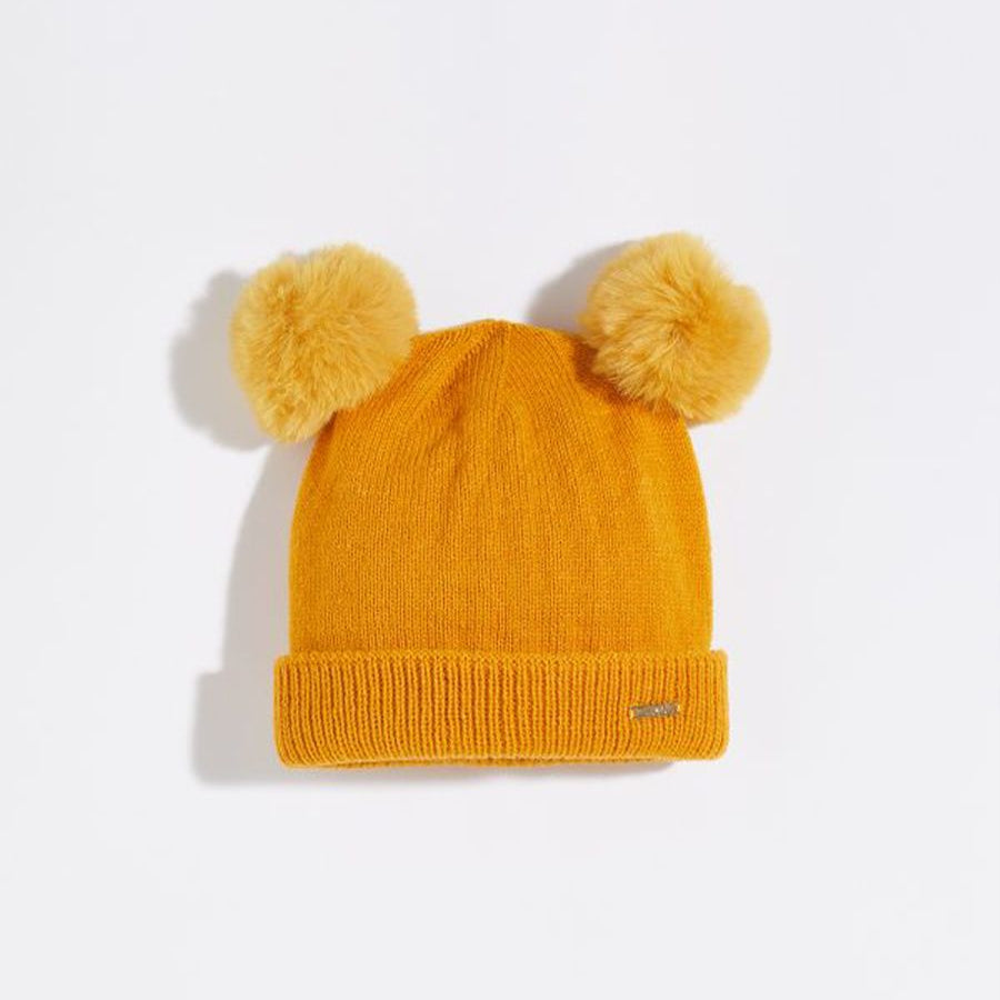 Knitted hat with pom pom